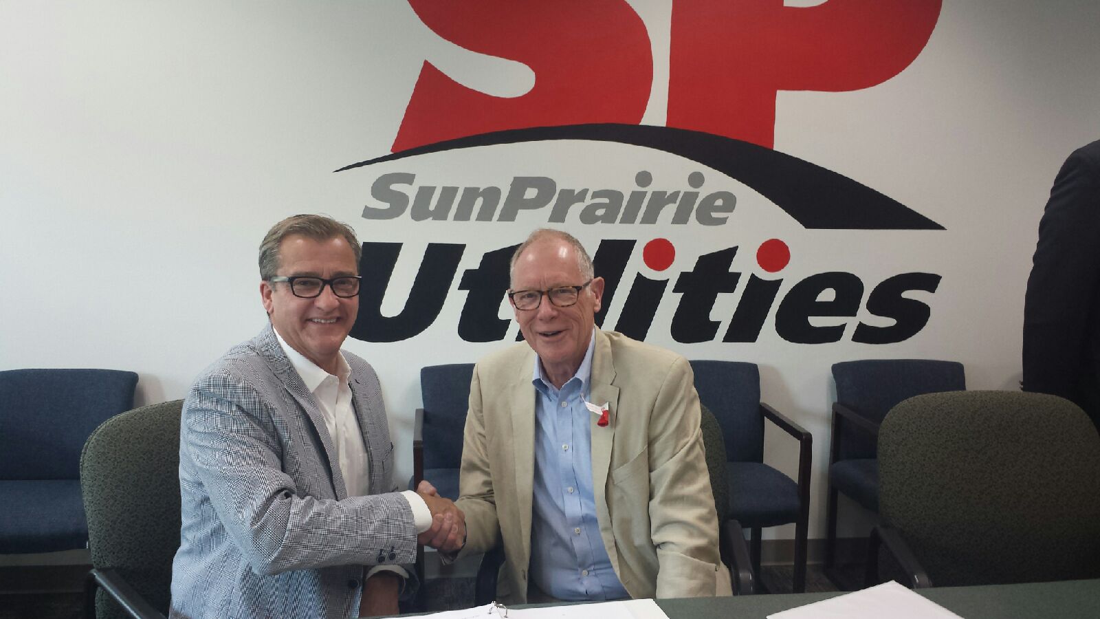 Jim Butman, COO at TDS and Paul Esser, Mayor of Sun Prairie