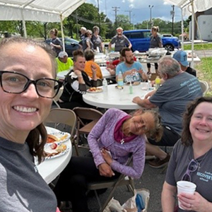 A group of TDS volunteers at a community event