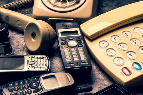 A close-up photo of many different types of phones