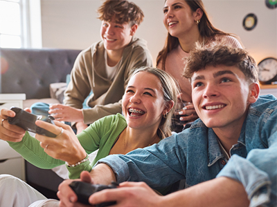 Download in a Flash A group of teenagers playing video games
